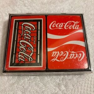 Vintage collectible Coca Cola playing cards, one set is unopened, other used